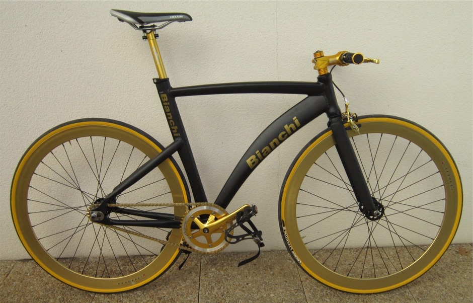 black and gold fixie bike